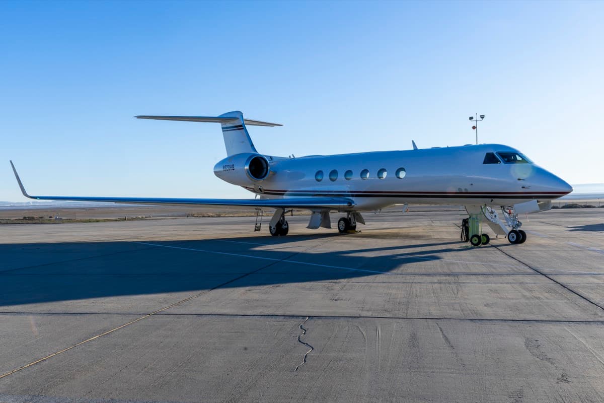 A Gulfstream aircraft on an empty ramp